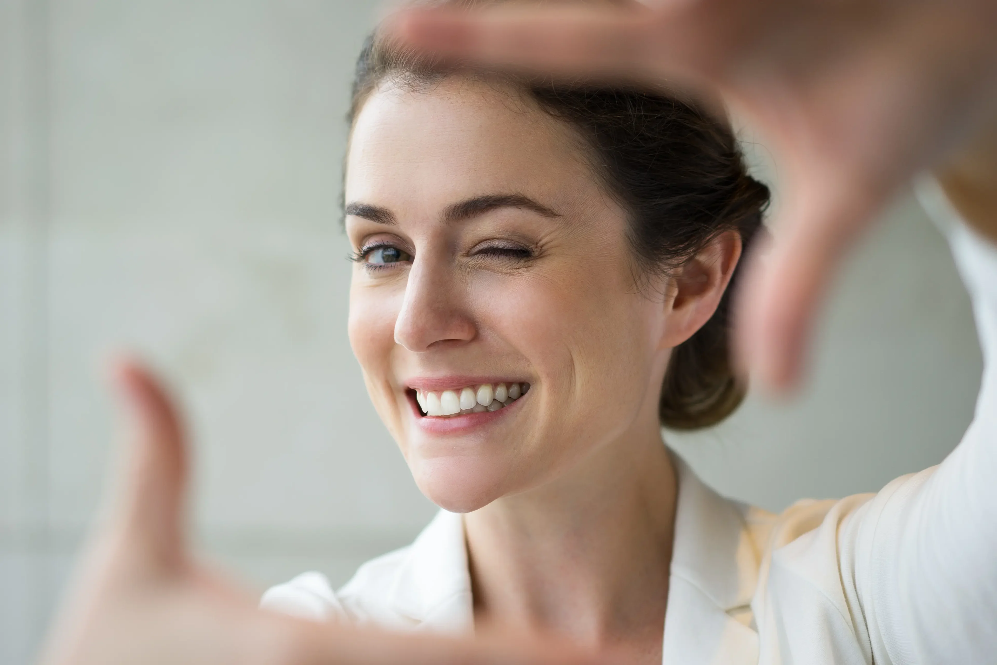 Closeup Smiling Woman Making Frame Gesture