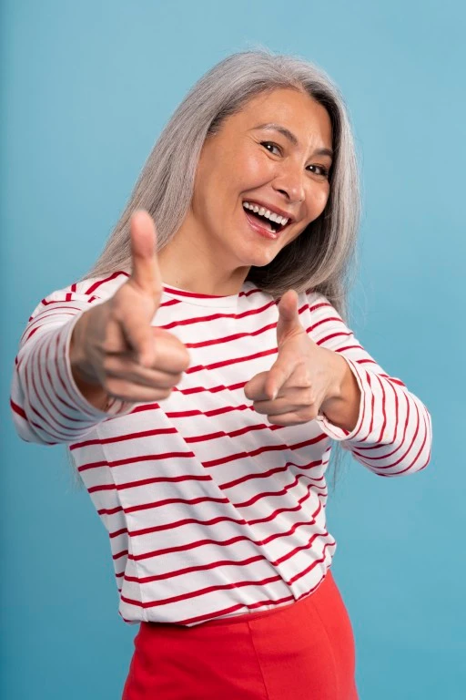 Senior Woman With Full Mouth Dental Implants Bridge